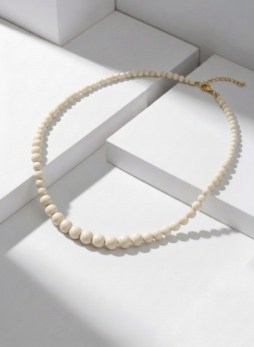 Collar HUESO BOLAS